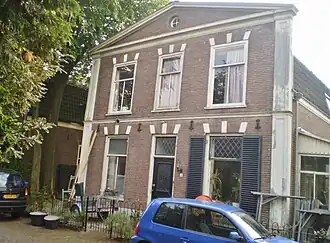dienstwoning met tuinhek