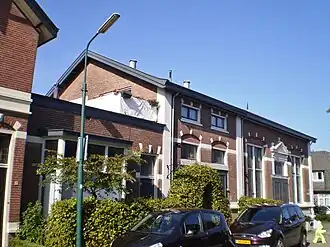 woonhuis met Verenigingsgebouw