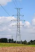 Tonmast met extra traverse voor de bliksemdraden - Waasmunster, België