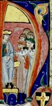 Raymond met rode hoofdeksel, tegenover Boudewijn IV.