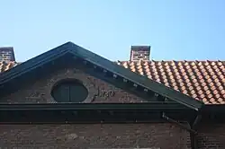 Fronton noordgevel poortgebouw met jaartal A°/1780