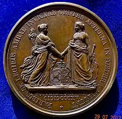Op de achterkant van deze medaille ter herdenking van de eenwording van de Nederlanden: België en Nederland