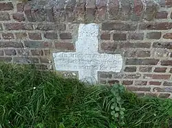 Ingemetseld moordkruis in Van Tienhovenmolen