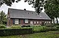 Kortgevelboerderij, van één bouwlaag met zadeldak en topgevels
