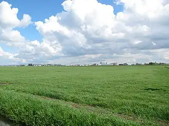 Zicht op polder Oudeland en het bedrijventerrein vanuit polder Rodenrijs