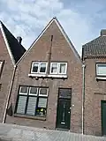 Woonhuis, deel van blok van zeven woonhuizen