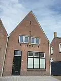 Woonhuis, deel van blok van zeven woonhuizen