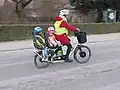 Longtail-fiets met twee kinderen achterop