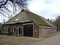 Hallenhuisboerderij met wapensteen
