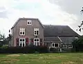 Boerderij Rodijk, 'herenhuis' tegen oude boerderij aan gebouwd