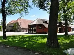 Boerderij met koetshuis