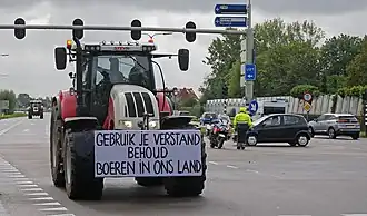 Trekker met protestbord in Den Haag, 1 oktober 2019