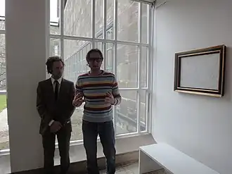 Ronald Snijders (l.) en Pieter Jouke (r.) doen een rondleiding bij Boijmans in Staat van Verwarring