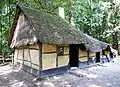 'Kelderhut' - Reconstructie van een kuilwoning, een van de meest primitieve woonvormen uit de Kempen