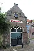Het brandspuithuisje aan de Kruisstraat is nu particulier eigendom en in gebruik als kantoorruimte