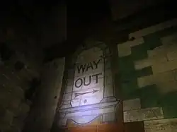 Wegwijzer bij het voormalige perron