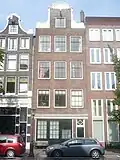 Huis, de zandstenen onderdelen van de gevelhals