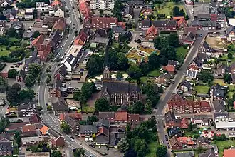 Luchtfoto van Buldern met de nieuwe Sint-Pancratiuskerk