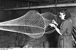 Repareren van een fuik (boeten)