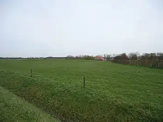 afgeplatte heuvel in de weilanden in Heuven