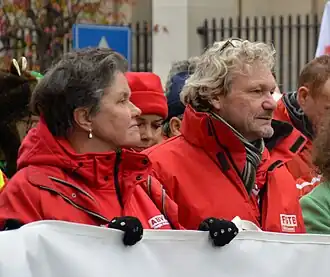 Caroline Copers met ABVV-voorzitter Thierry Bodson op een koopkrachtbetoging eind 2022