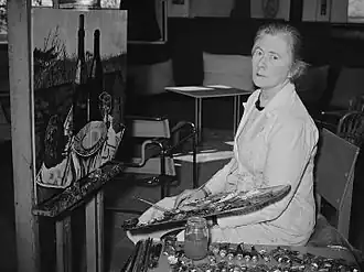 Portret van Charley Toorop in haar atelier in Bergen, 1951, door Harry Pot