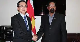 Yang Zigang (links) in 2014