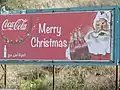 Ook in Israël heeft kerstmis een commmercieel titje gekregen, reclame van Coca Cola in Nazareth