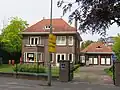 Tweelaagse villa in Amsterdamse school-stijl