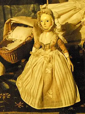 Pop in de kraamkamer in het poppenhuis van Agnes Maria Clifford, Amsterdam 1785-1810