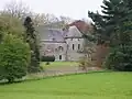 Ensemble van het middeleeuwse kasteel, diens park en vallei van de Ruisseau