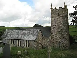 De kerk, toegewijd aan de H.-Johannes-de-Evangelist.