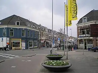Damstraat met vooraan rechts de Leidsekade