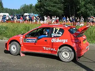 Carlsson in zijn 206 WRC in 2004