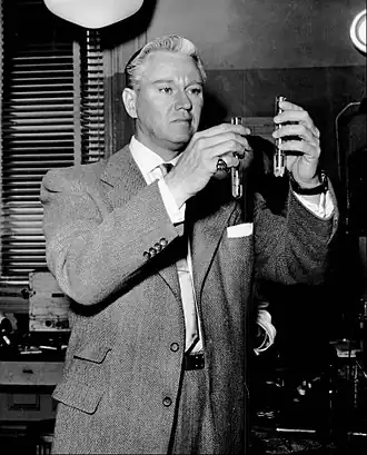 David Brian in Mr District Attorney (1954)