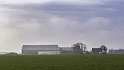 Boerderij De Haar gezien vanaf de weg tussen Ulrum en Leens