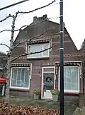 Winkel met woning