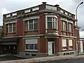 Art-decogetint winkel-woonhuis van 1930