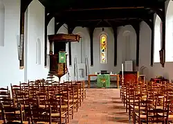 Interieur met peekstoel