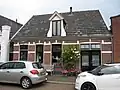 Woonhuis-winkel