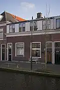 Woonhuis in 1863 gebouwd als arbeiderswoning in het rijtje van Rietveld 175-187. Gebouwd in sobere traditioneel classicistische vormen. Verbouwd onder meer in 1930.