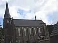 Kerk van de H. Willibrordus, met Heilig Hartbeeld