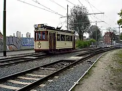 Motorwagen 265, als lijn 7, op de Parallelweg, halte Wouwermanstraat, tijdens een van de zondagse rondritten.