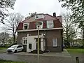 Voormalige dienstwoning van “Geneeskundig Gesticht voor Krankzinnigen Oud-Rosenburg”, gebouwd langs de oprijlaan van landgoed Oud-Rosenburg