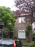 Onderdeel van een reeks van 3 bouwblokken met elk 4 woningen