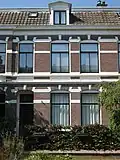 Onderdeel van een bouwblok van negen woningen
