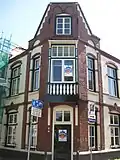 Woning/winkel, voormalig kaaspakhuis