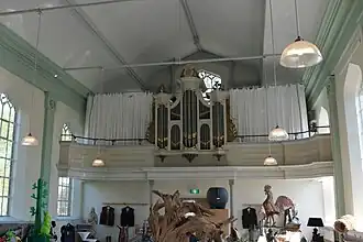 Interieur met orgel, winkel in 2019