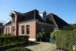 Woning met stolpschuur te Schellinkhout