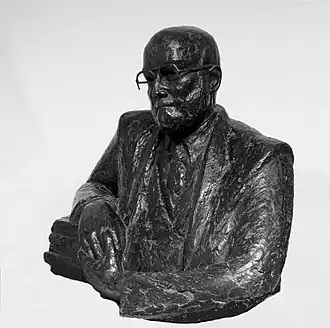 Gebeeldhouwd portret van Gerhard Durlacher in brons